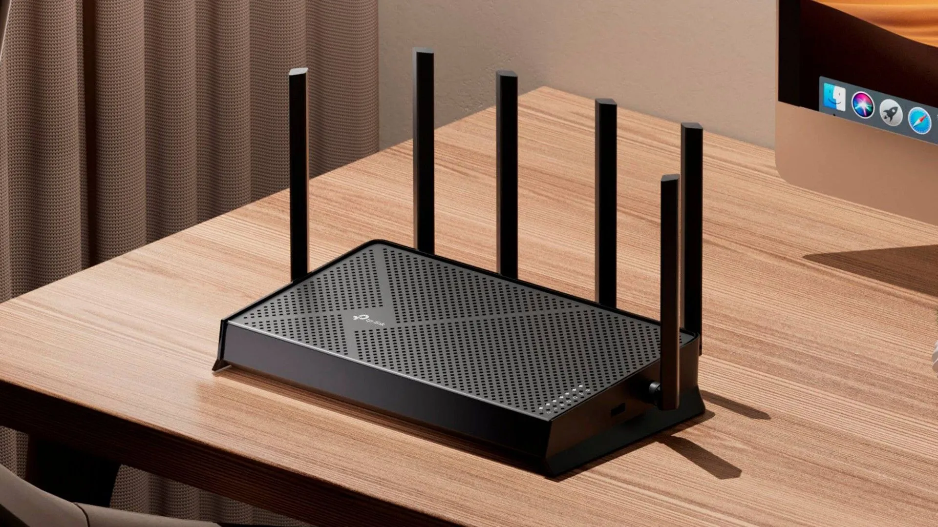Bộ định tuyến TP-Link Archer BE9700 Tri-Band Wi-Fi 7 trên bàn, sẵn sàng cho kết nối internet tốc độ cao.