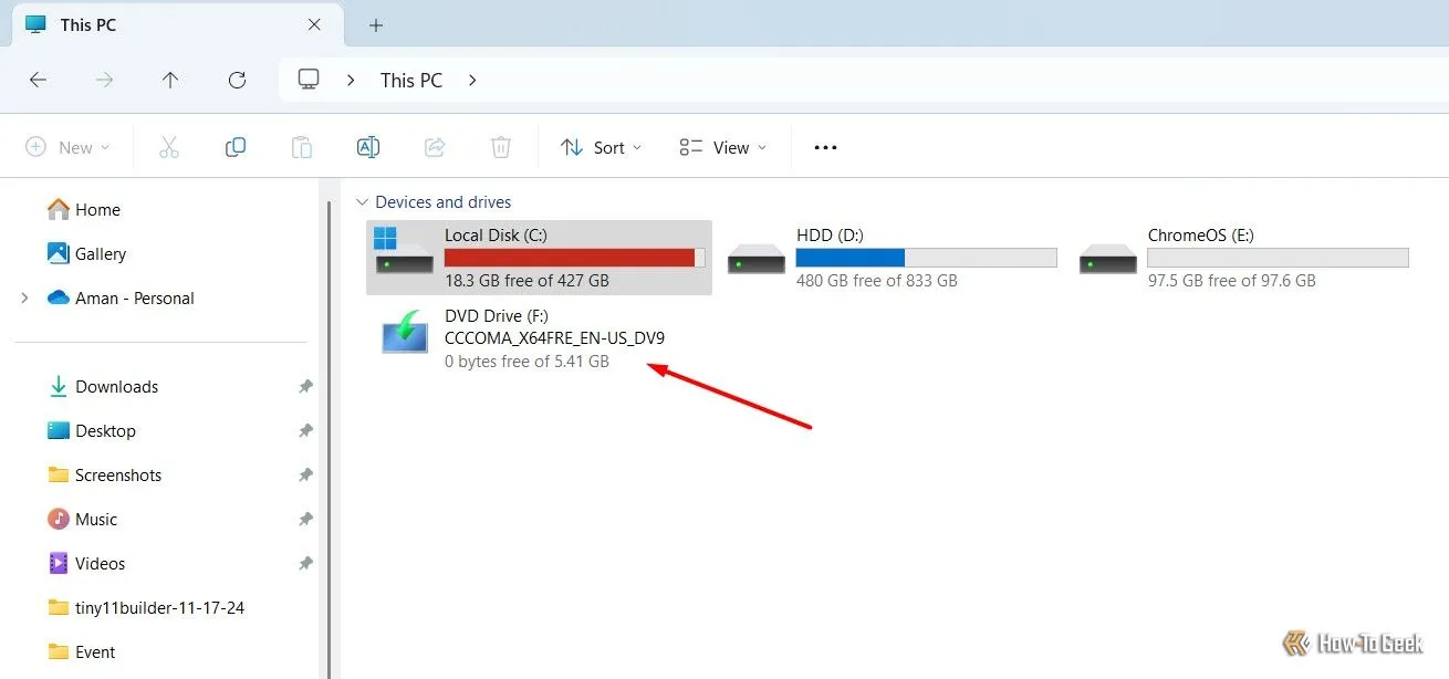 Giao diện This PC trên Windows 11 hiển thị các ổ đĩa và file ISO đã được mount.