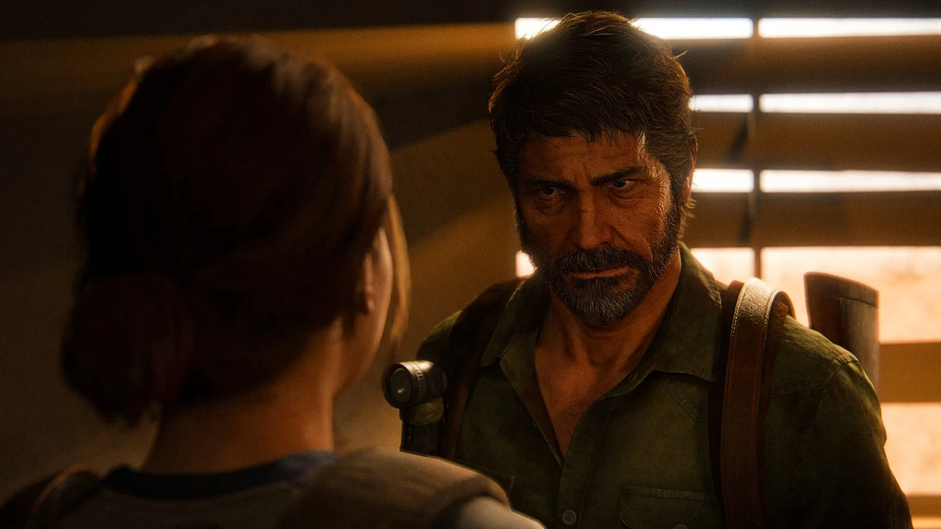 Joel nói chuyện với Ellie trong The Last of Us Part II, thể hiện mối quan hệ cha con sâu sắc giữa hai nhân vật.