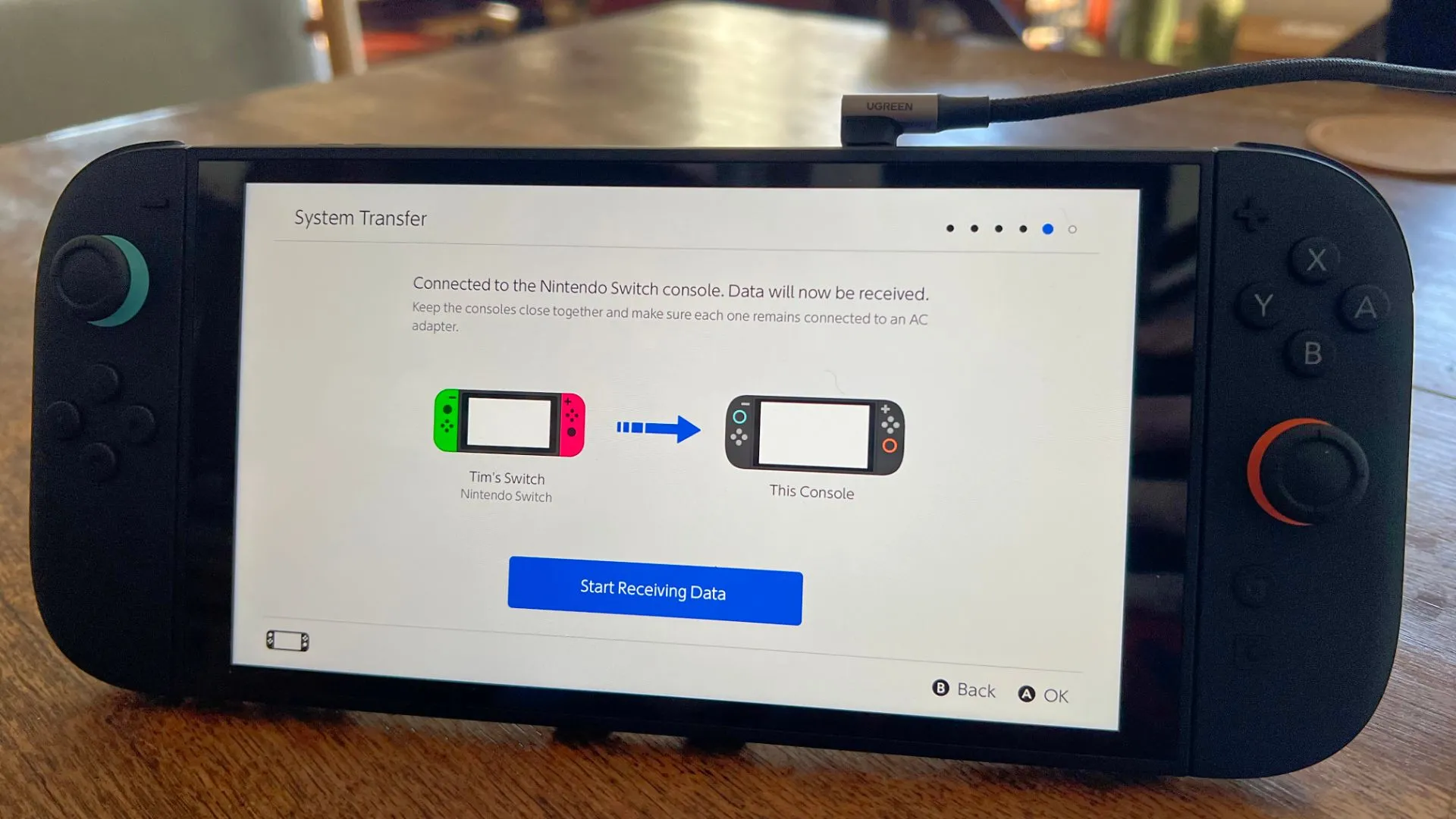 Màn hình chờ trên Nintendo Switch 2 trước khi bắt đầu quá trình nhận dữ liệu từ máy cũ.