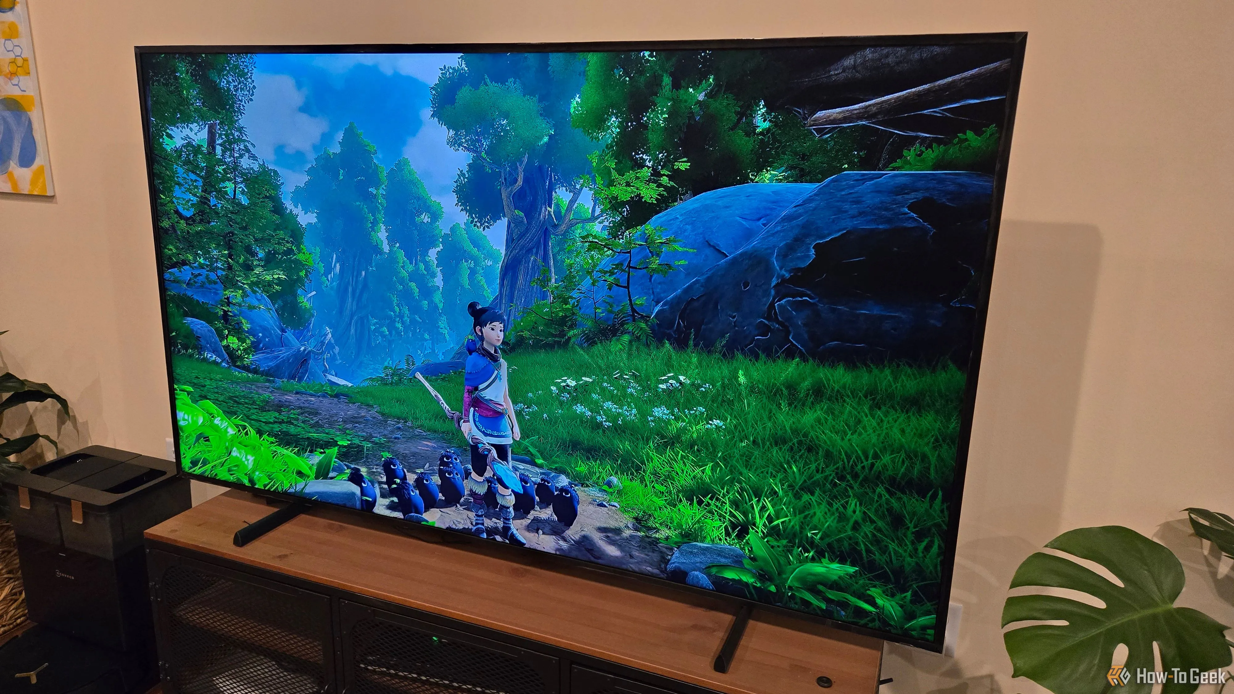 Màn hình TV Samsung Frame hiển thị game Kena: Bridge of Spirits được stream qua NVIDIA GeForce NOW, thể hiện chất lượng đồ họa ấn tượng.