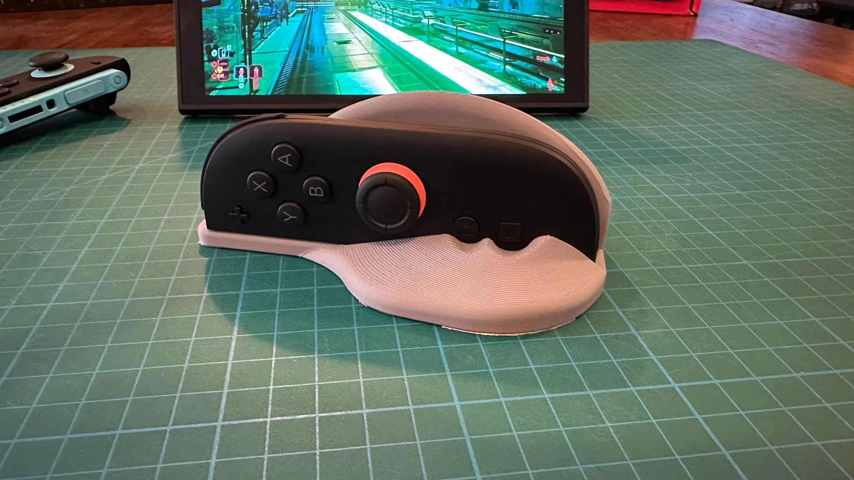 Mẫu adapter chuột Rewolf được in 3D, thiết kế công thái học để gắn Joy-Con 2 của Nintendo Switch, cải thiện trải nghiệm sử dụng chuột.