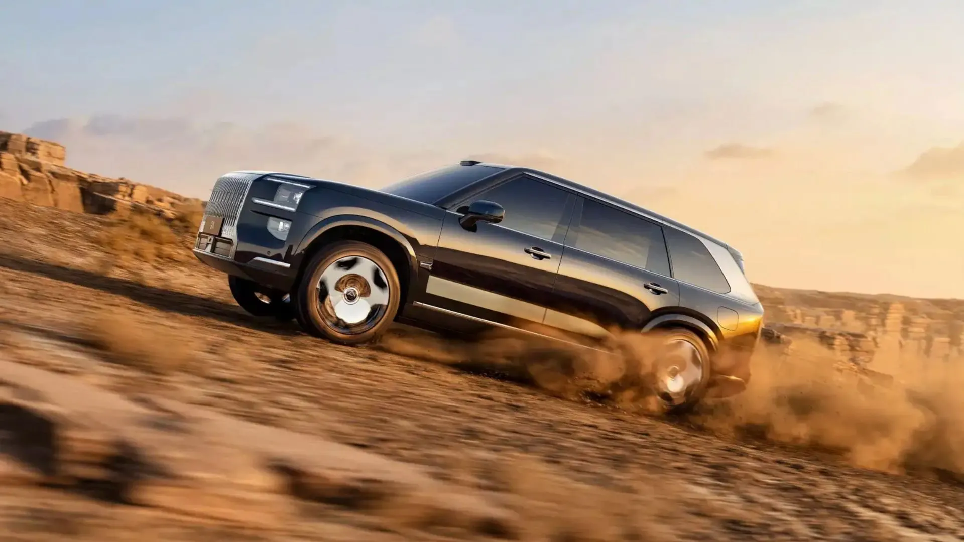 Mẫu SUV điện Zeekr 9X với thiết kế sang trọng, mạnh mẽ đang di chuyển trên địa hình sa mạc.