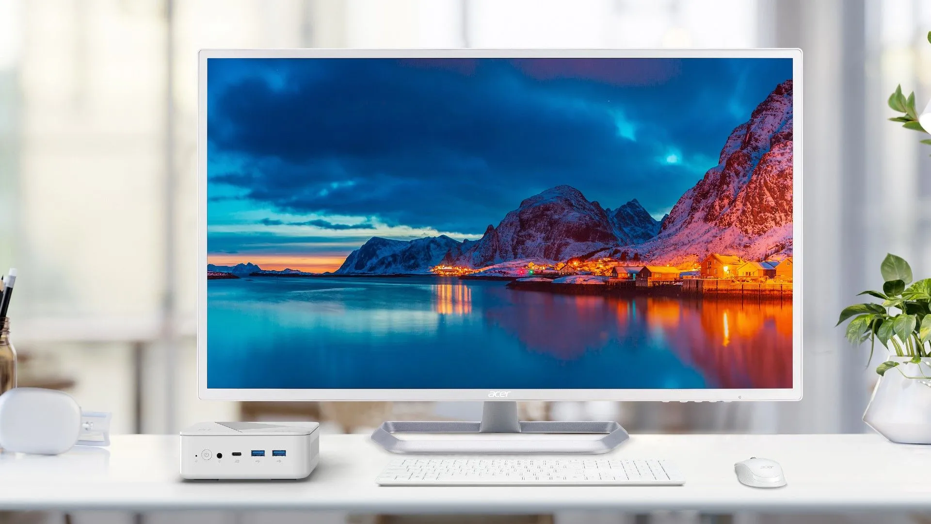 Máy tính mini Acer Revo Box AI đặt cạnh màn hình, lý tưởng cho môi trường làm việc chuyên nghiệp.
