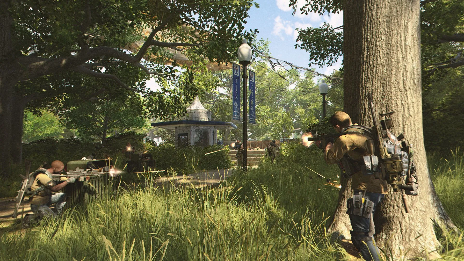 Một cảnh đổ nát của Washington D.C. trong The Division 2, với các tòa nhà quen thuộc và thảm thực vật mọc khắp nơi, thể hiện sự tái tạo chi tiết nhưng hỗn loạn của thành phố.