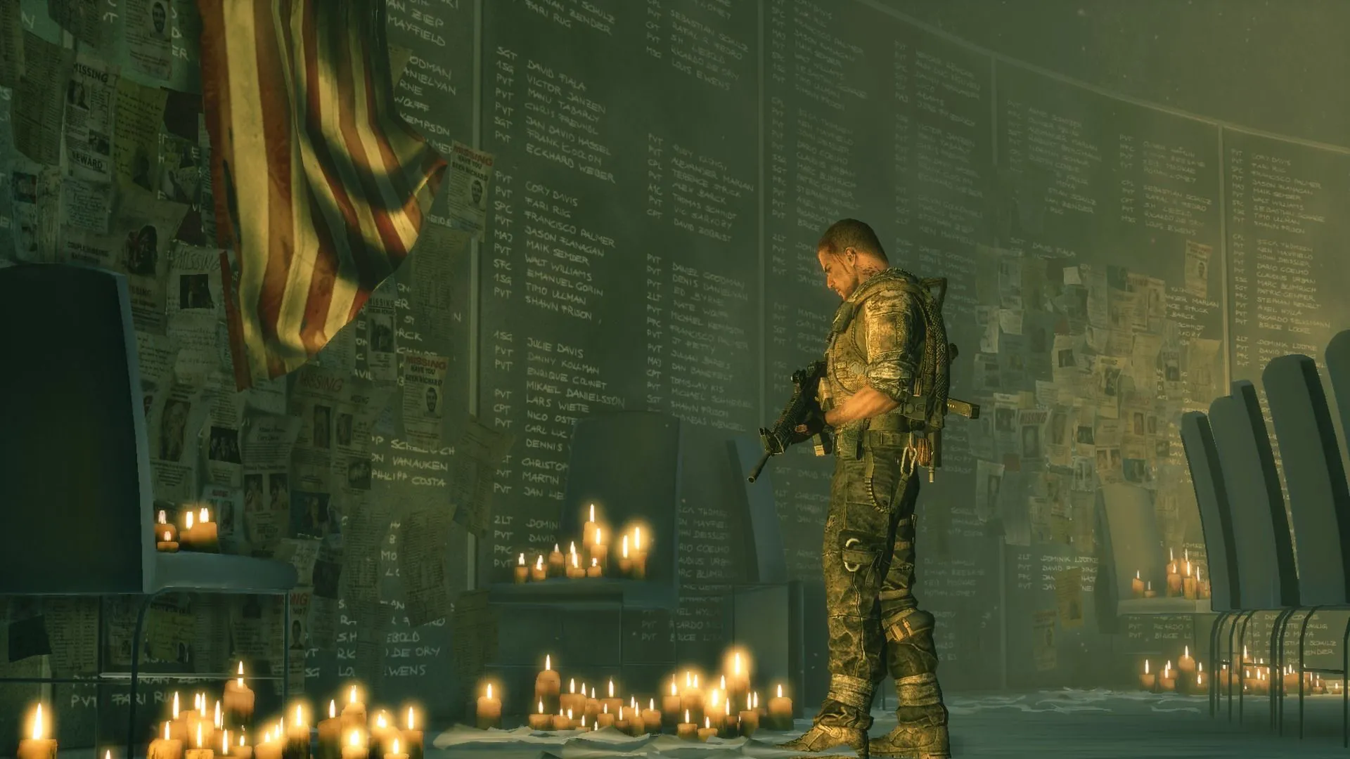 Nhân vật chính trong Spec Ops The Line nhìn vào một bức tường tưởng niệm, khung cảnh gợi lên sự tàn khốc của chiến tranh.