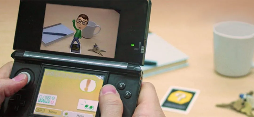 Nhân vật Mii đang tạo dáng trong trò chơi AR Games trên Nintendo 3DS, thể hiện khả năng thực tế tăng cường của máy