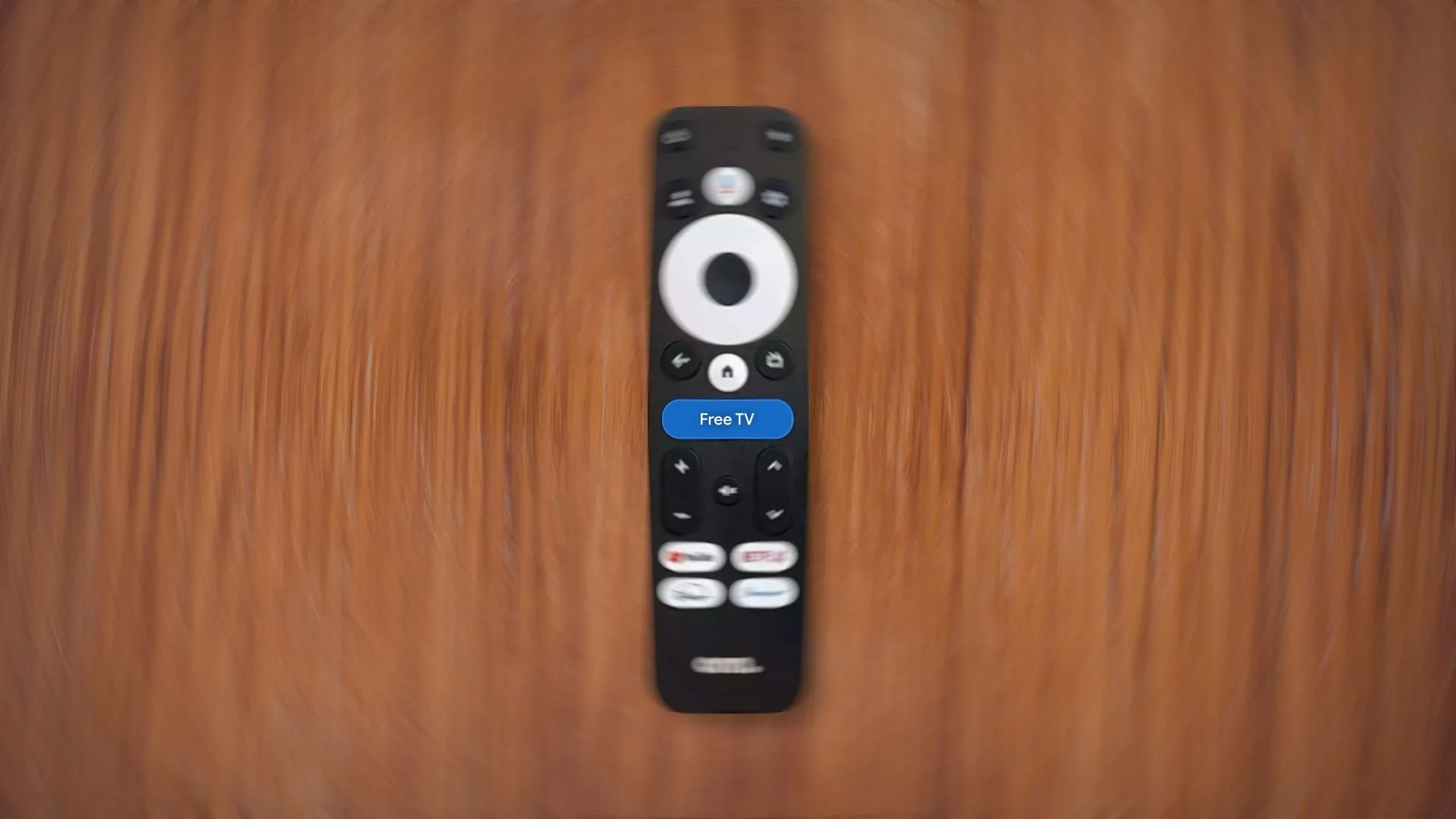Remote Google TV với nút Free TV nổi bật ở giữa
