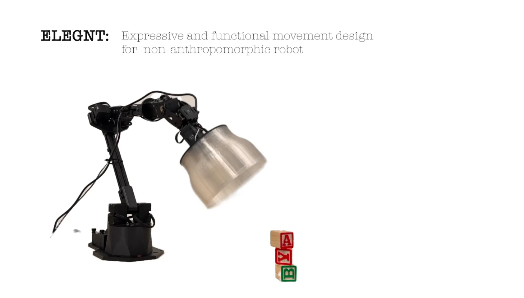 Robot arm from Apple's machine learning research with a lightbulb