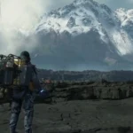Sam Porter Bridges di chuyển qua địa hình hiểm trở trong Death Stranding, một game mô phỏng vận chuyển trong thế giới hậu tận thế.