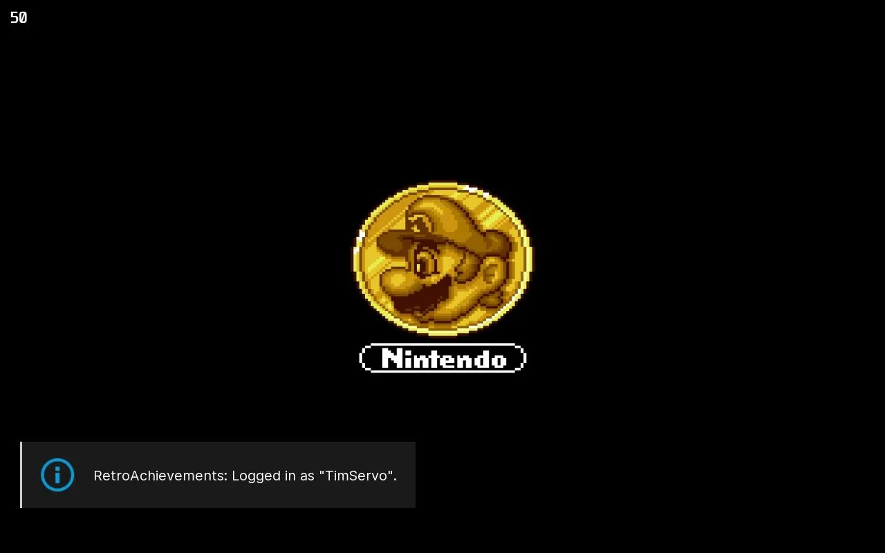 Thông báo đăng nhập RetroAchievements thành công xuất hiện trên màn hình khi khởi động game, xác nhận kết nối giữa giả lập và dịch vụ.
